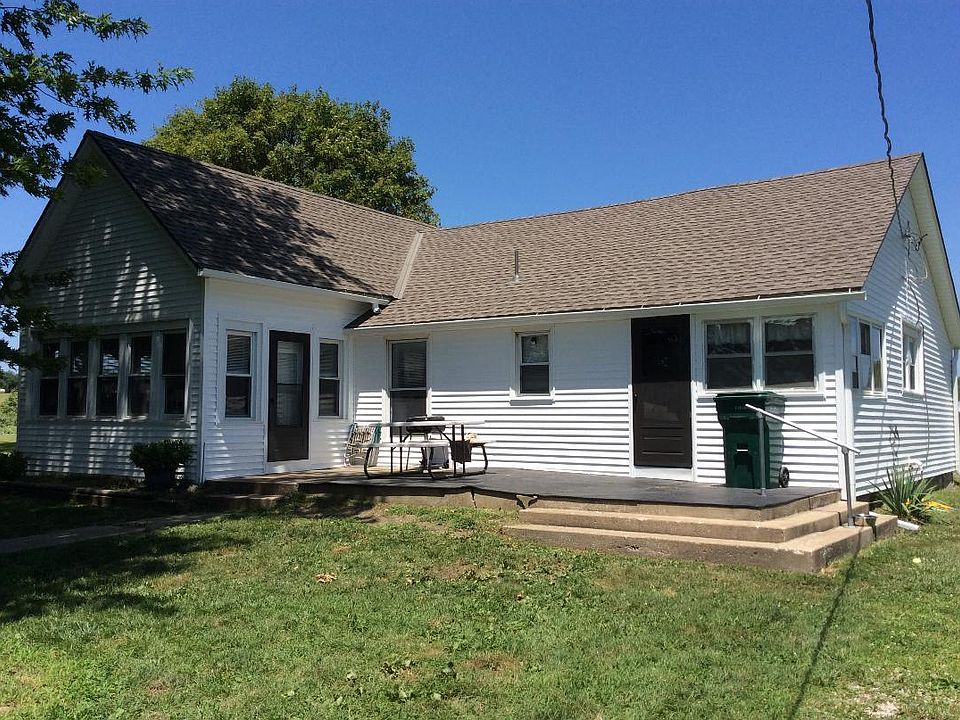 Front porch with 2 screed doors for entry. Brand new 30 year Timberline roof, gutters and insulated vinyl siding installed 2019.