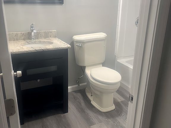 Full bathroom with vanity