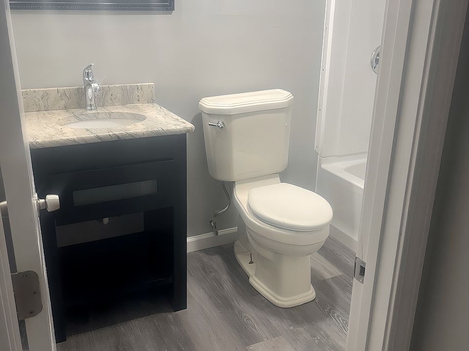Full bathroom with vanity