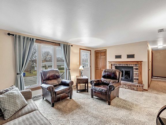 Living room w/cozy wood burning fireplace