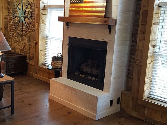 Fireplace with gas logs.