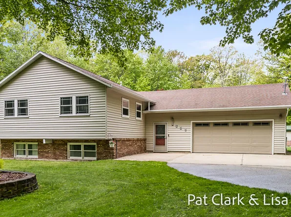 9133 Lamos Rd, Montague, MI 49437