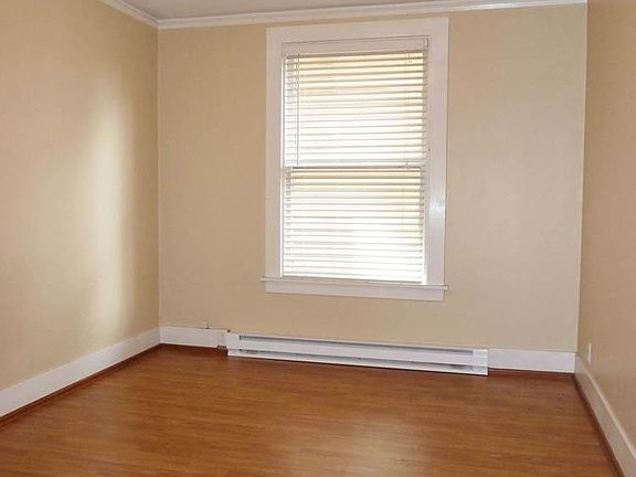 Main Bedroom.

Side notes:

We will be installing new hickory flooring, which has a lighter tone.

Window faces wall of neighboring house so doesn't get great natural light, but does yield complete privacy.