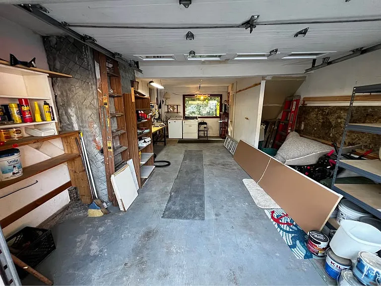 Shared Garage. We only really need storage for some things here and there but for the part its yours! Fit your car, mancave or anything else you want in this big garage!