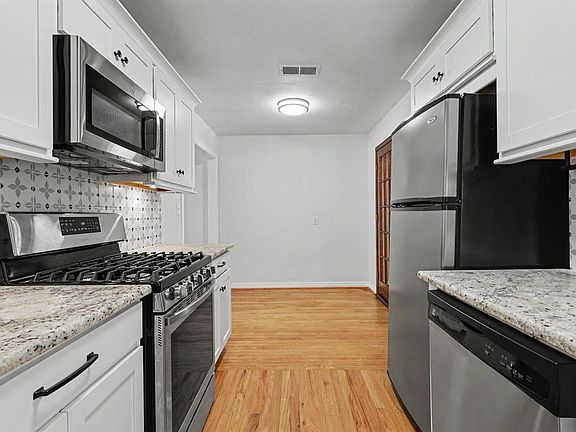 3rd image of 1503 Downing St