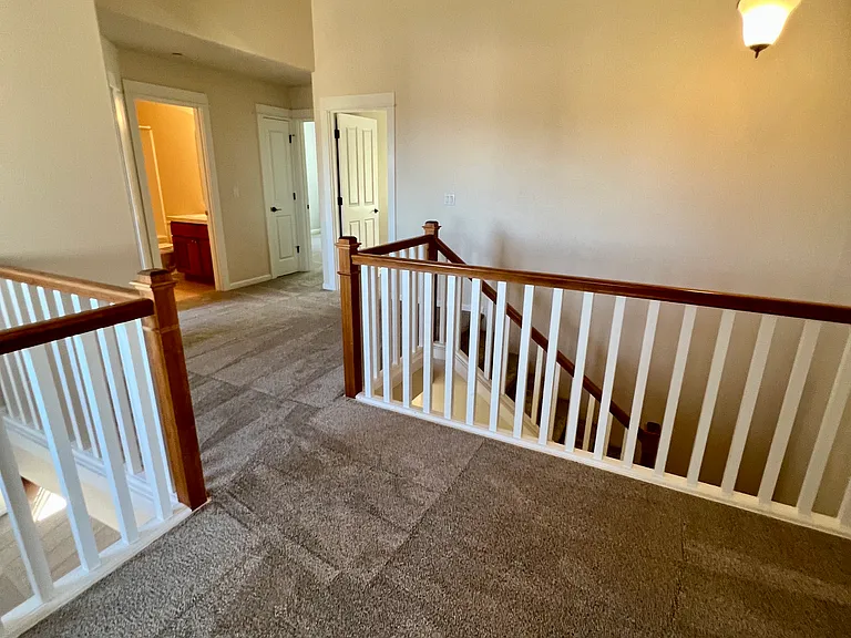 Upstairs hallway with vaulted ceiling