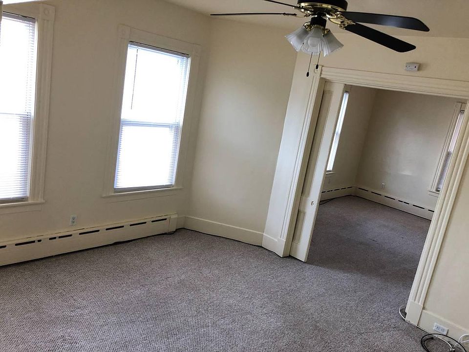 Living Room Features High Ceilings, Ceiling Fan, Energy Efficient Windows