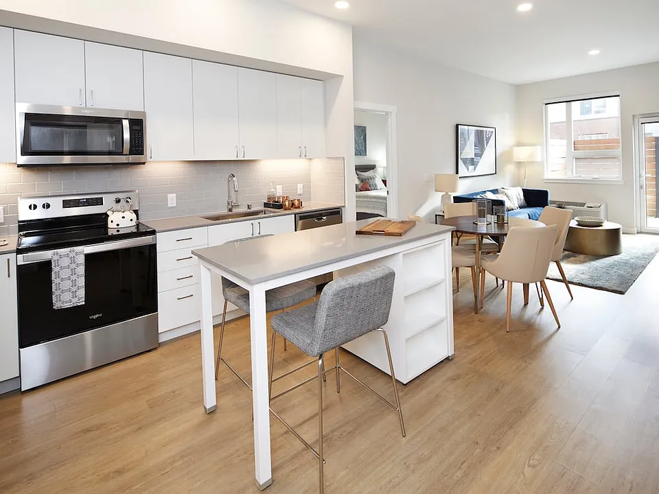 Phase II - Scheme C Kitchen, living, and dining areas with hard surface flooring
