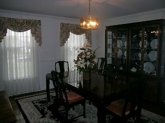 Dining Room has gleaming hardwoods