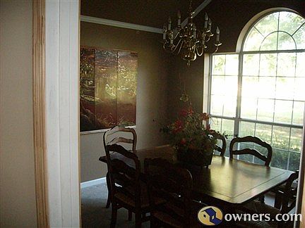 Formal Dining Room with Cathedral Ceiling