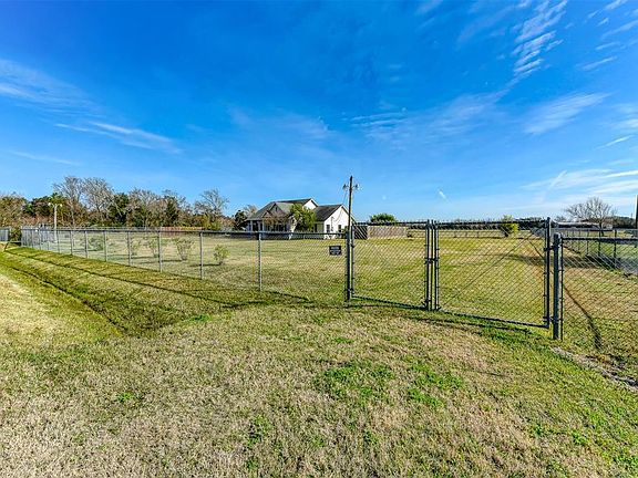 Second driveway on the front side of property.