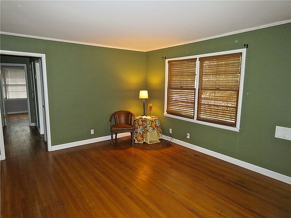 Formal living room and hallway to master bedroom and 2nd bedroom and hall bath.