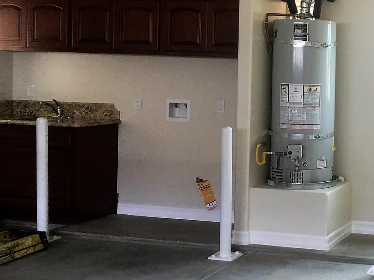 LAUNDRY NOOK WITH GAS AND ELECTRIC OPTIONS. GRANITE COUNTERTOP, SINK AREA AND EXTRA CABINETS.