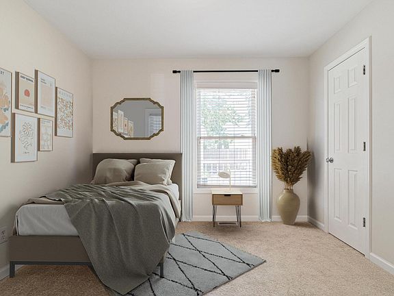 Bedroom 2. Tranquil Music City bedroom with serene backyard views. Relax in your private retreat, where the city's rhythm meets nature's melody. Home has new carpet. Home has been virtually staged.
