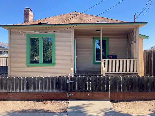 Street view of house front.