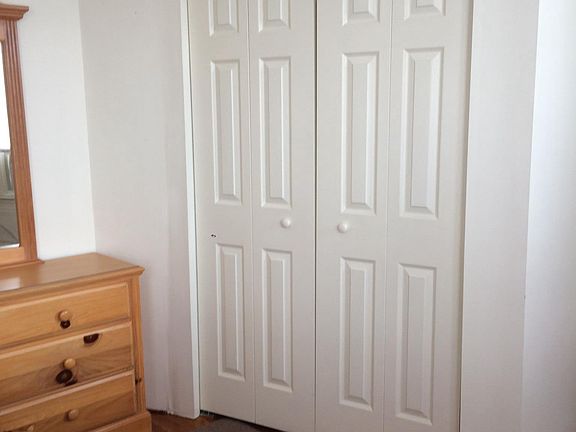 double door closet in bedroom