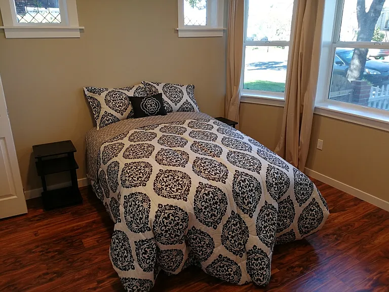 Front bedroom - Showing the Victorian original windows and new bay windows.