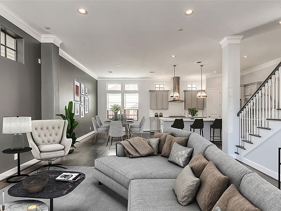 Second floor LR/DR/Kitchen is open concept, great for entertaining or hanging out at home! High ceilings, recessed lighting, and dark stained solid oa