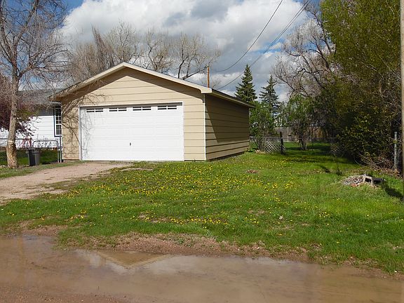 RV parking beside garage