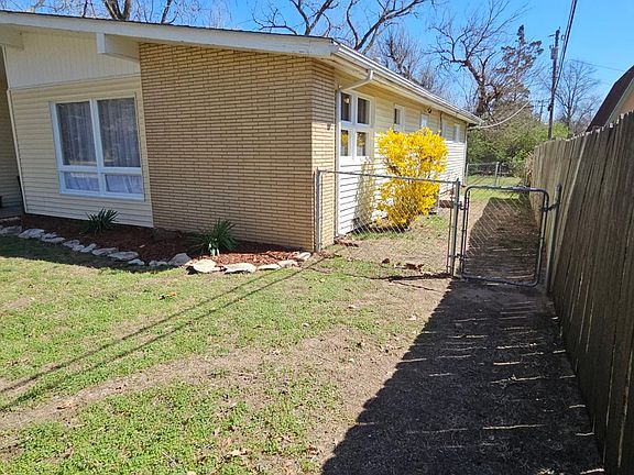 Side yard is fenced, making a smaller play area.