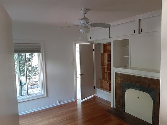Freshly painted bedroom with built in storage
