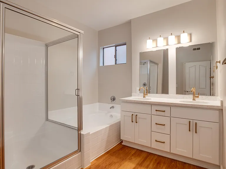Large bathroom with ample light and double vanity