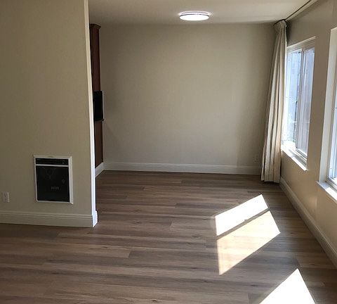 View from living room looking towards dining table area.
