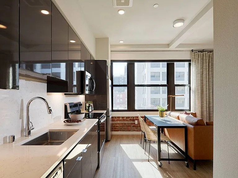 Oversized windows and roller shades in some homes*