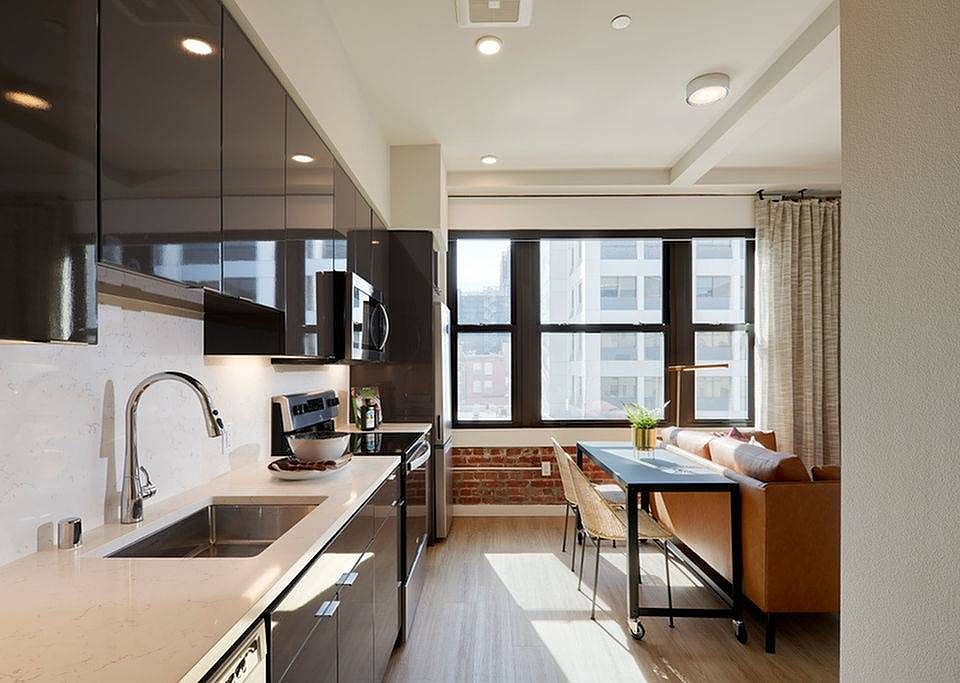Oversized windows and roller shades in some homes*