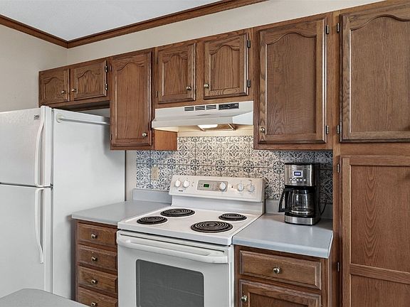 5th image of 4545 Westchester Dr NE Unit D