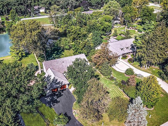 Beautiful, private neighborhood with mature trees and water view