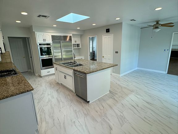 Spacious kitchen with eating area