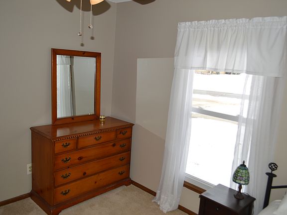 one of three bedrooms