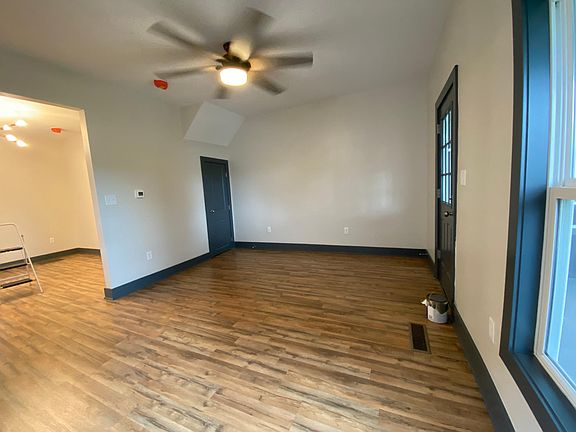 Living room and coat closet.