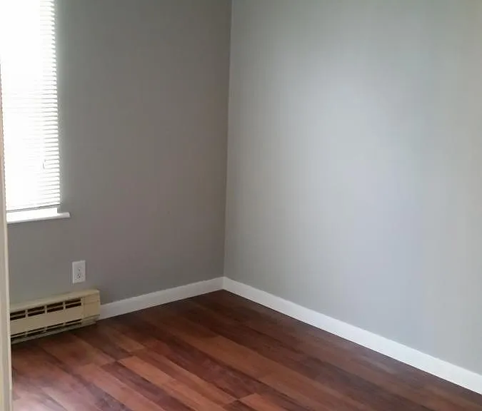 Hardwood floors in two bedrooms.