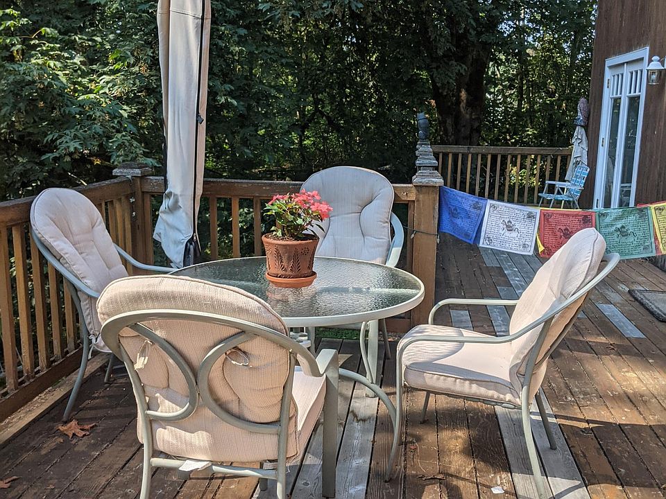 Dedicated deck space just for the apartment, with table and chairs and large patio umbrella, to make the deck useable in any weather!
