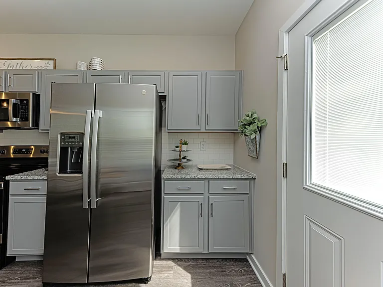 Kitchen with granite counters and stainless appliances