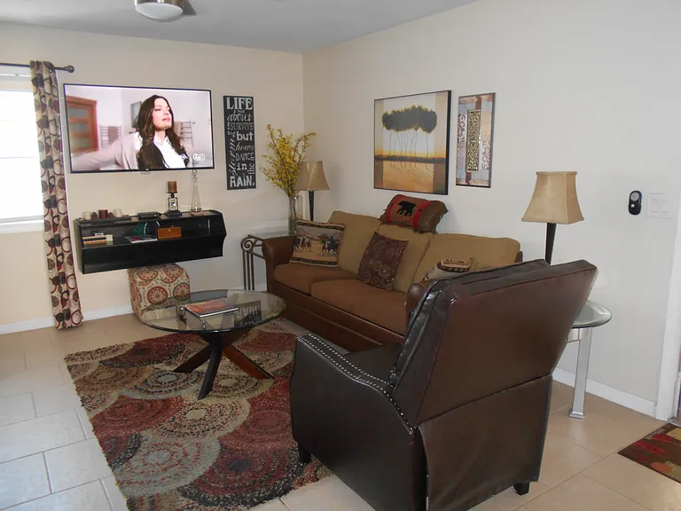 New leather recliner, Queen sleeper sofa, 55" Roku TV & 2 lounge chairs