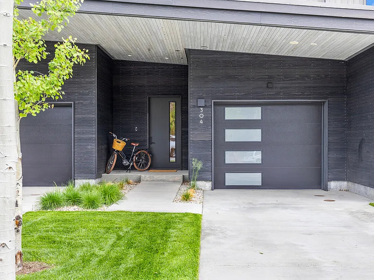 Townhome 304 from the street. 1 car private garage plus space for 2 tandem cars in drive (and street parking for guests)