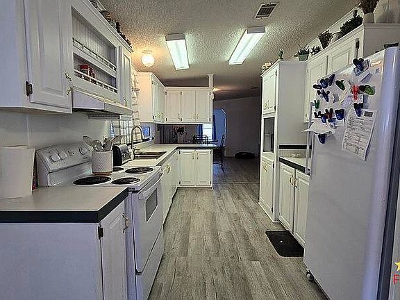 4th image of 7823 Walkers Cay Ave