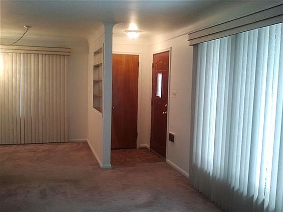 Living room with recessed entry