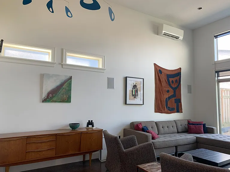 Family Room With Access to Back Yard/Patio. 14' ceilings.