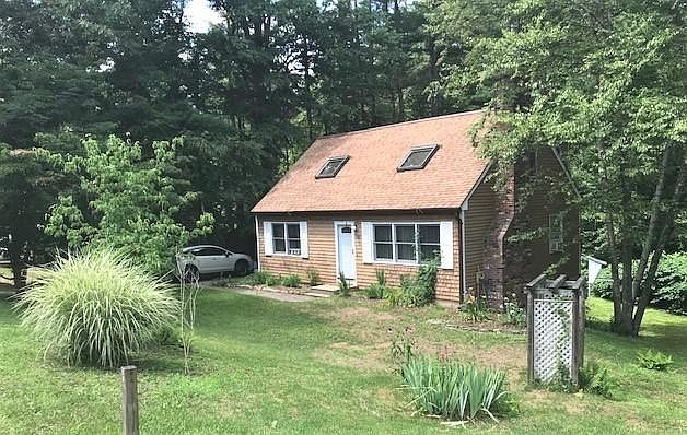 Front of house, showing side and back yard