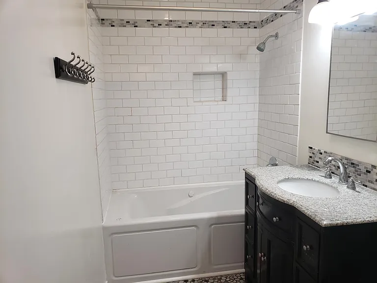 Another detailed photo of restroom, sky light, tile and basic color to blend in with your color scheme