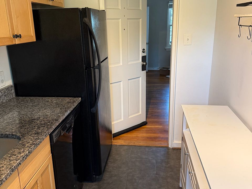 Gallery kitchen; optional extra cabinet can be left for tenant