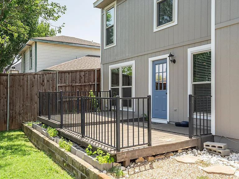 The deck across part of the back of the house is a great sitting area.