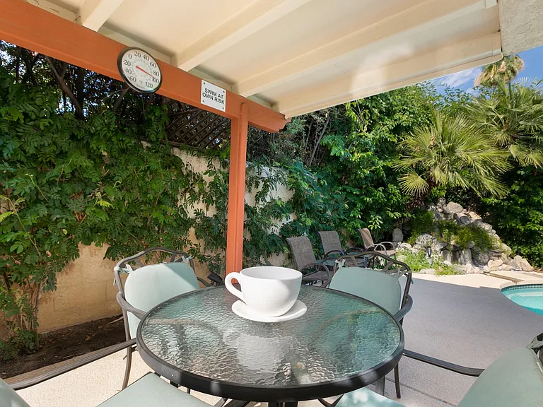 Outdoor breakfast area seats 4.