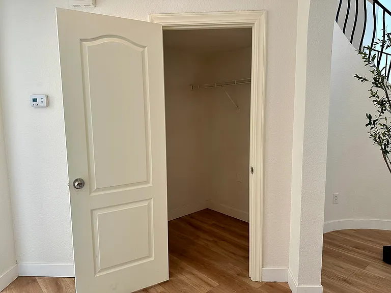 Storage room under the stairs