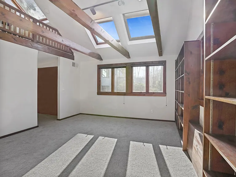 Office/Bedroom features a Loft area, Skylights and a Full Bath.