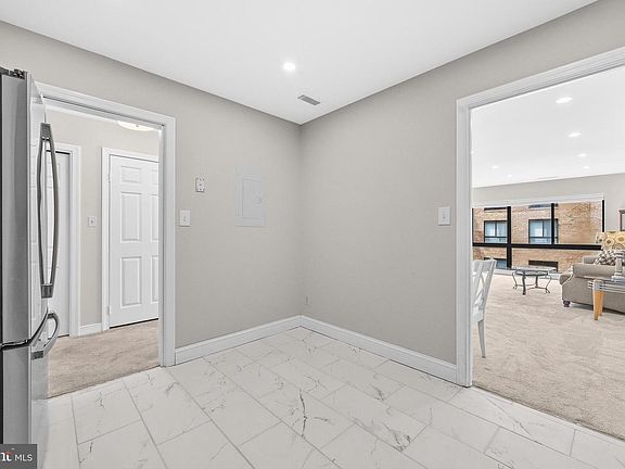 5th image of 11400 Strand Dr APT 201